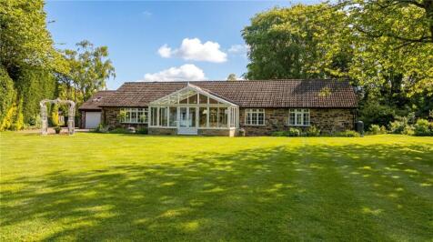 Tucked away within a private and substantial plot in the heart of highly sought-after Roundhay, The Paddock is a truly unique detached bungalow offering generous and versatile accommodation, a self-co