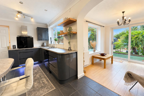 Bright Contemporary Kitchen and Dining Space.png
