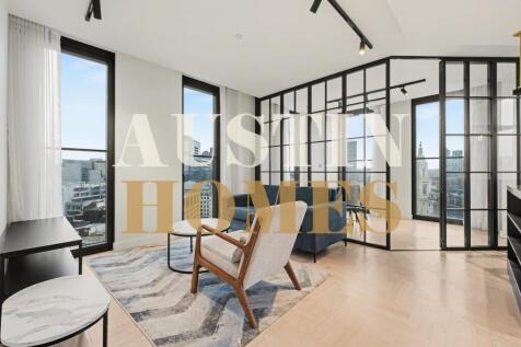 Stylish 2-bed, 13th floor apartment with skyline views, open-plan living, luxury amenities, concierge, and excellent transport links in a prestigious London development. Book your viewing today.