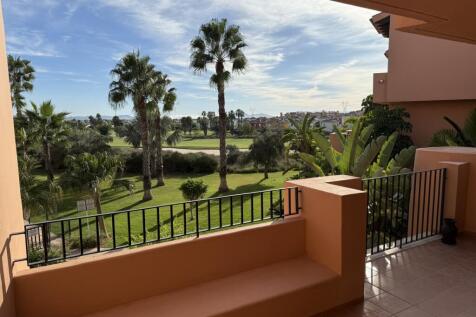 Mar Menor Golf Resor apartment with views of the pool and golf course