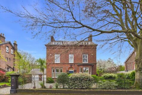 A delightful and distinctive detached residence set within substantial landscaped grounds in this picturesque conservation area.