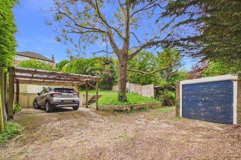 CARPORT, DRIVEWAY & GARAGE