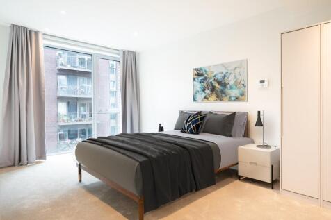 Experience the tranquility of this serene and stylish bedroom, perfect for restful nights.