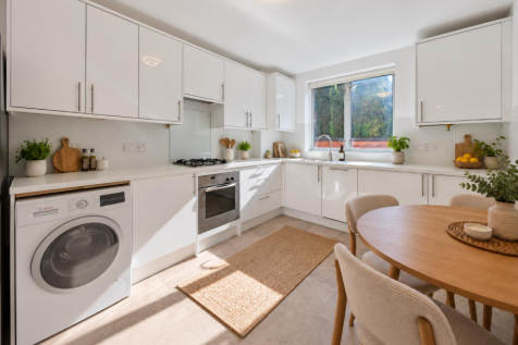 Bright Scandinavian Kitchen with Subtle Washing Ma