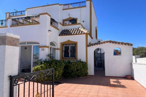 Vistabella golf Quad Villa with communal pool