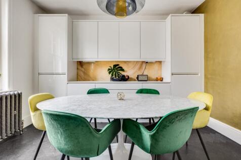Beautifully presented throughout, this spacious 3 bedroom apartment has been fully renovated throughout and is located within a red brick mansion block