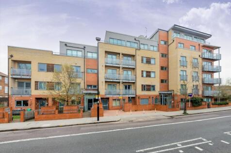 A spacious one double bedroom apartment with Juliet balconies and lift access on the third floor of a modern development.