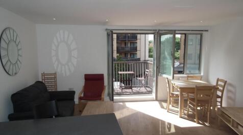 Spacious apartment with laminate flooring throughout in the Vizion 7 development which provides a Residents Gym and concierge. The property benefits from an open plan kitchen reception with integrated