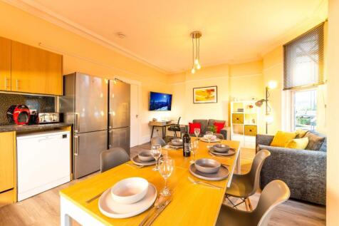 Bright open-plan living and dining area with a ...