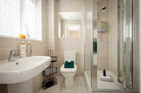 En-suite shower room away from the family