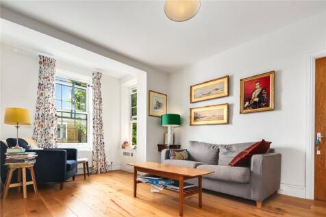 Occupying part of the second floor of this secure development is this absolutely stunning apartment boasting charming and stylish decor with fireplaces, wood flooring and large double glazed windows f