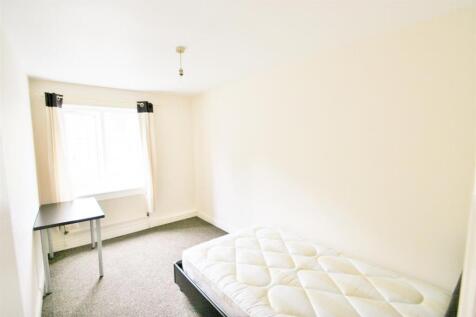 Bright and welcoming bedroom with natural light...