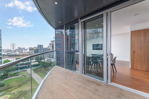 Luxurious 1,158ft² apartment with direct river views, stylish furnishing, comfort cooling & secure underground parking.
