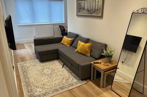 Sitting area AND DOORS TO BALCONY